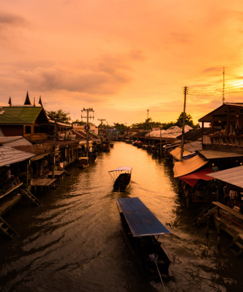 Floating market visit and rowing boat ride with transfer (sharing basis)